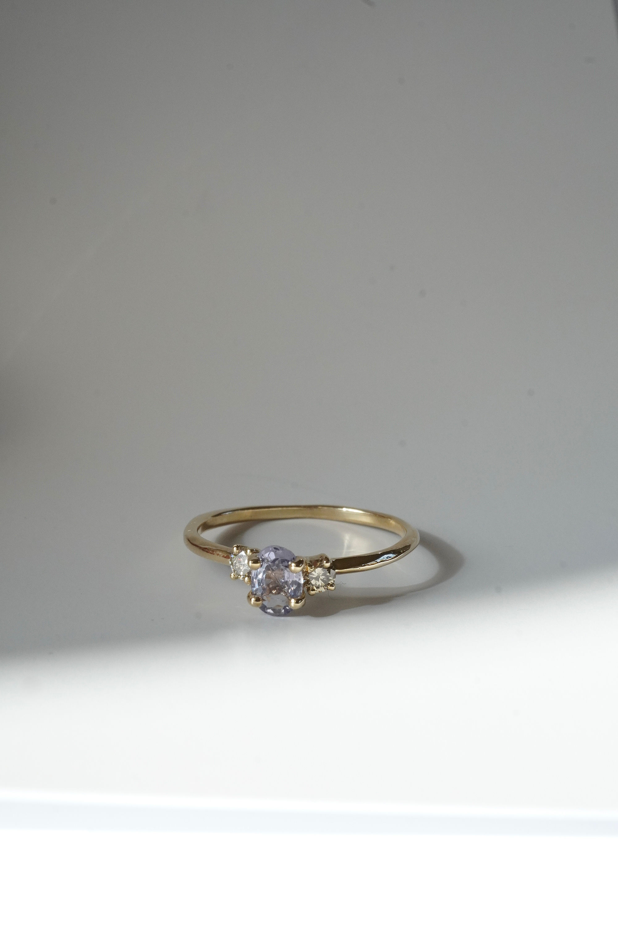 oval blue sapphire and beige diamonds