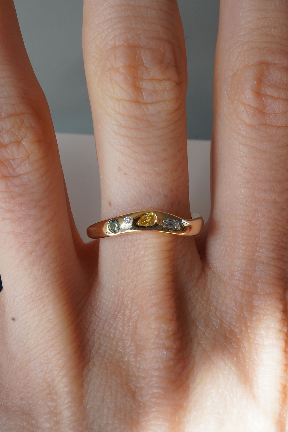 Thumbnail: four gems in curvy ring