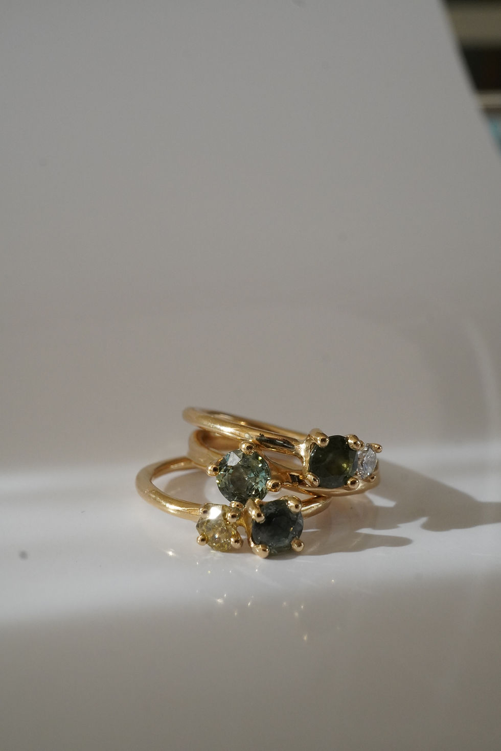 Thumbnail: green sapphire and white diamond couple