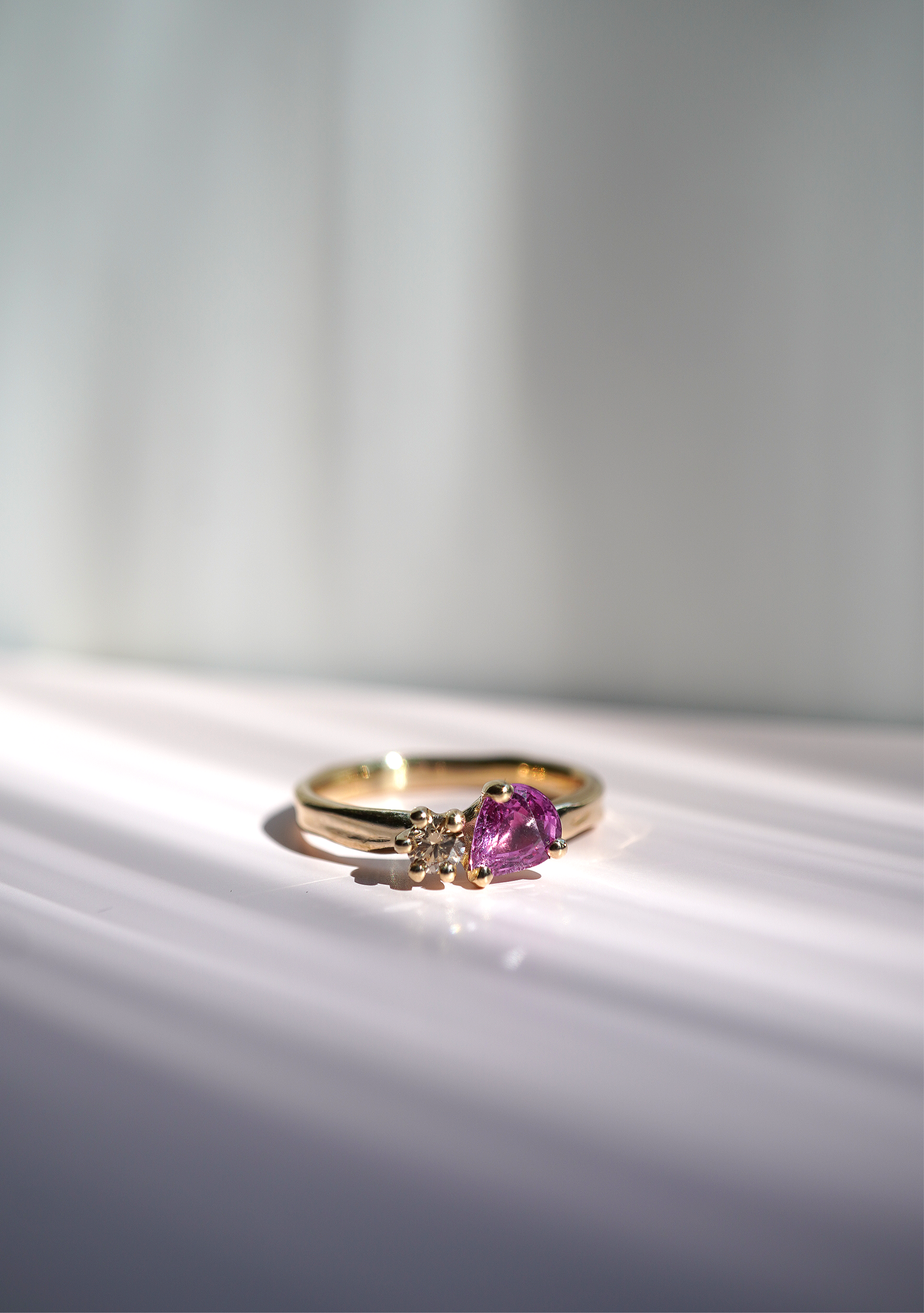 Pink pear sapphire and beige diamond