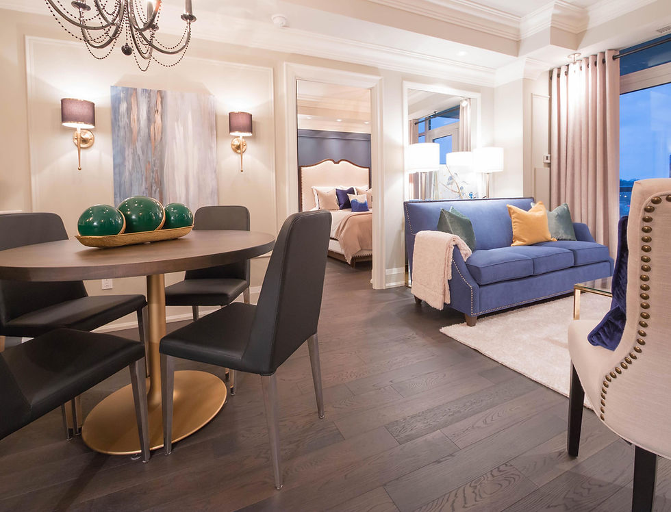 Condo in Etobicoke with layered lighting solutions. Sconces, chandelier and recessed lights.