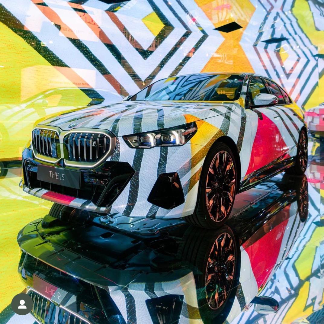 BMW Electric AI Canvas — a BMW i5 transformed into a dynamic canvas featuring Esther Mahlangu's artwork, 2023