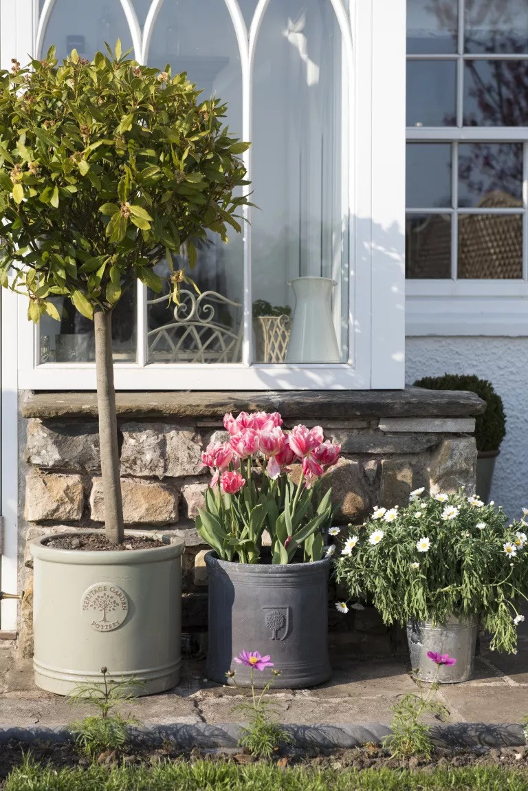 English Heritage Pottery displays English garden flowers. Image credit Real Homes