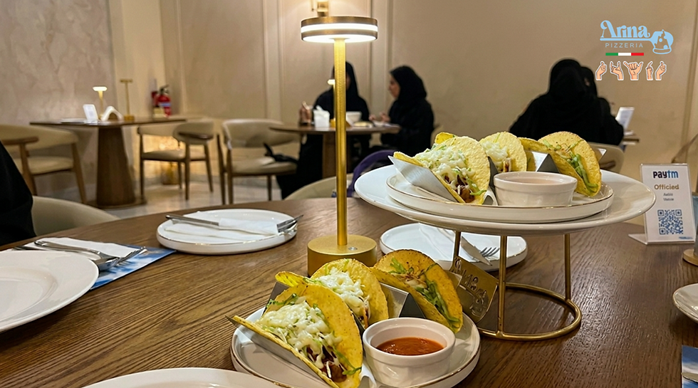 Charcoal chicken tacos in Qatif served at Arina Pizza with fresh ingredients and a comfortable dining atmosphere