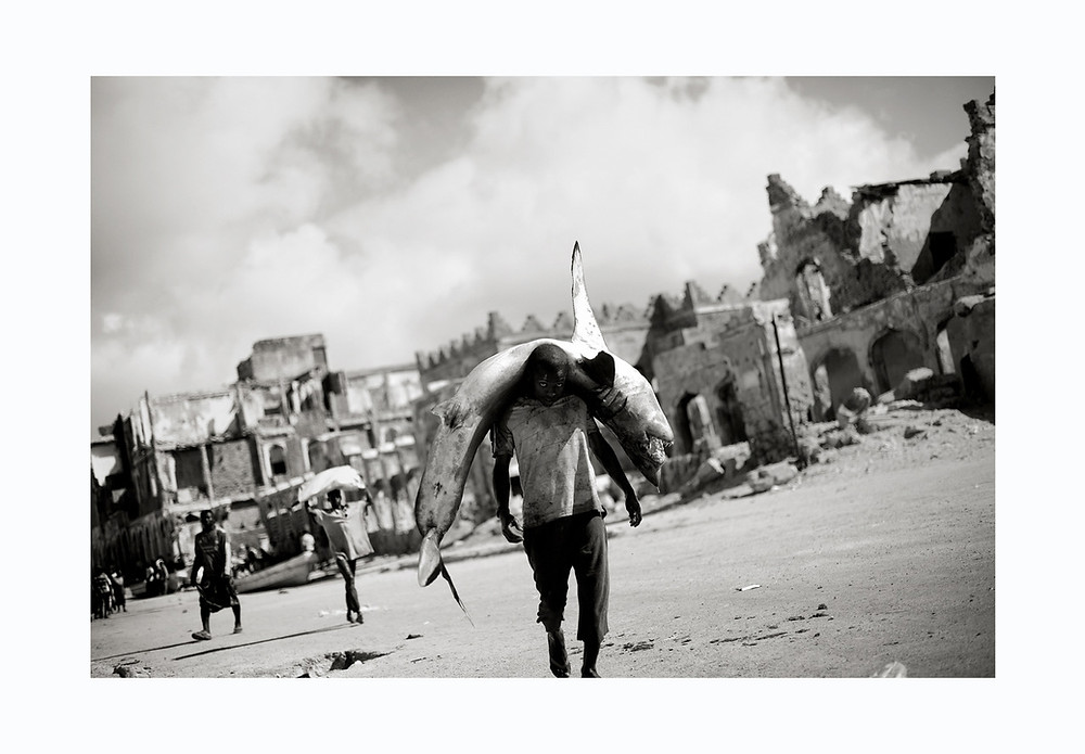 war, Afghanistan, Columbia, civilian, bombing, photojournalism, political conflict, documentary, war photography, explosion