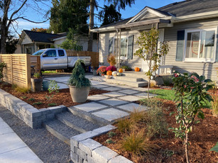 poured concrete, front yard, landscape design, garden design, short fence, architectural slab, steel and gravel steps, wall block, North Portland Oregon landscape design