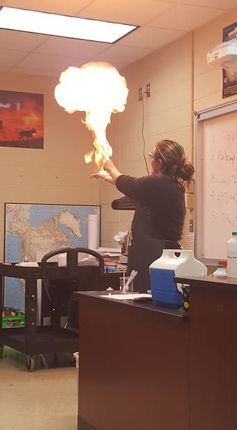 Ms. Tifani performing a Gas Law experiment.