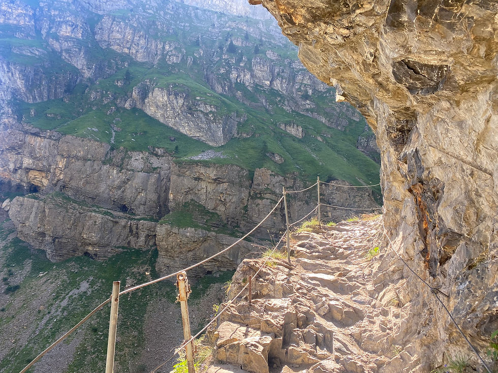 Trail cuts into the rock near the Cascade de Trainant