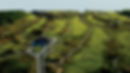 564a24d7bddbe7d62f03832f_Arcadia-Bluffs-Clubhouse-Aerial-Staff.jpg