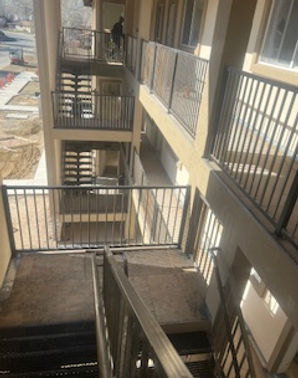 Apartment stairs, railings, and deck coating