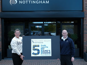 Balance Health Nottingham Leaders with My Name'5 Doddie Foundation charity sign
