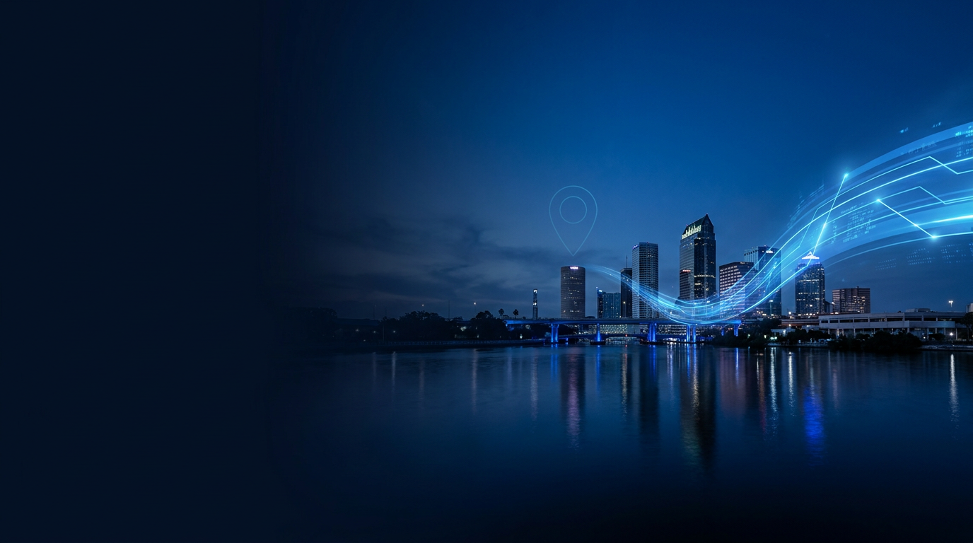 A cinematic view of Tampa at night with bright blue digital light trails