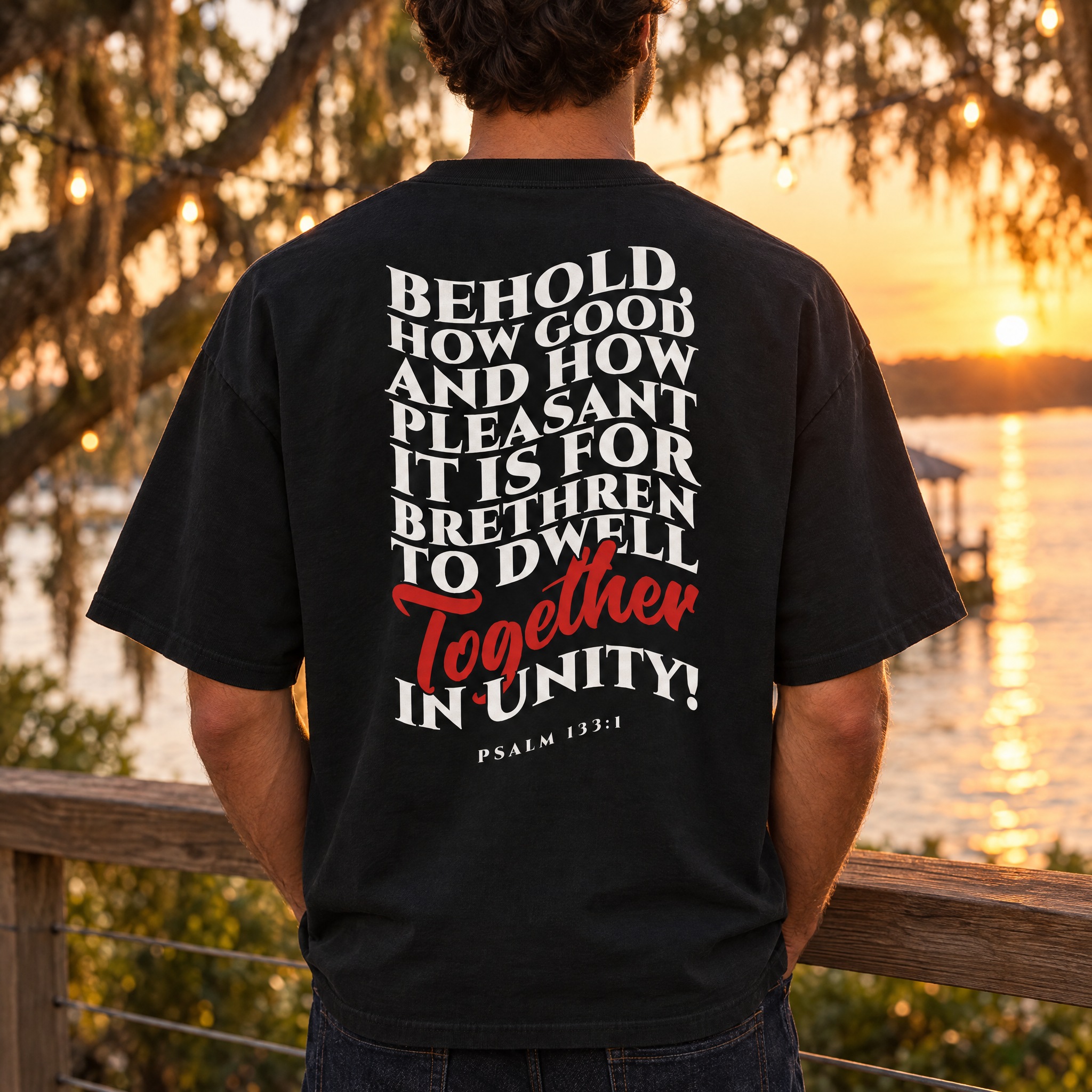 Back of the Black Together · Psalm 133 Oversized Tee: Psalm 133:1 'Behold, how good and how pleasant it is for brethren to dwell together in unity!' printed in white and red with a script 'Together'