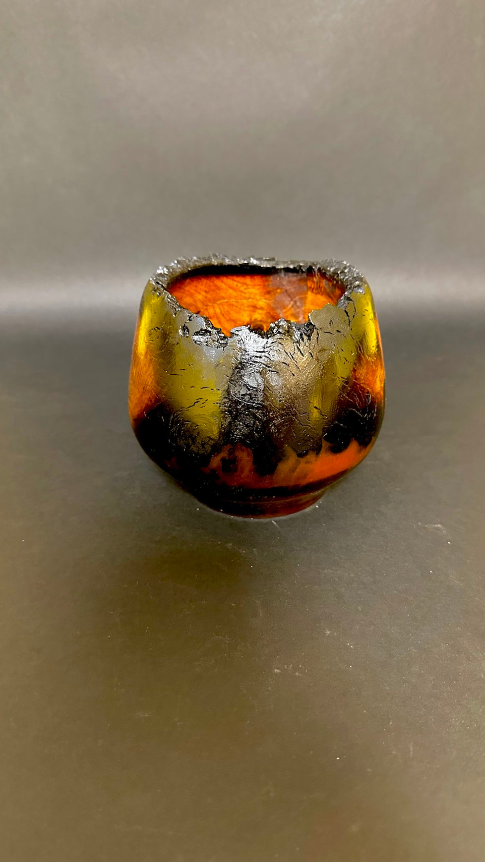 Burned mesquite with natural edge and epoxy resin.