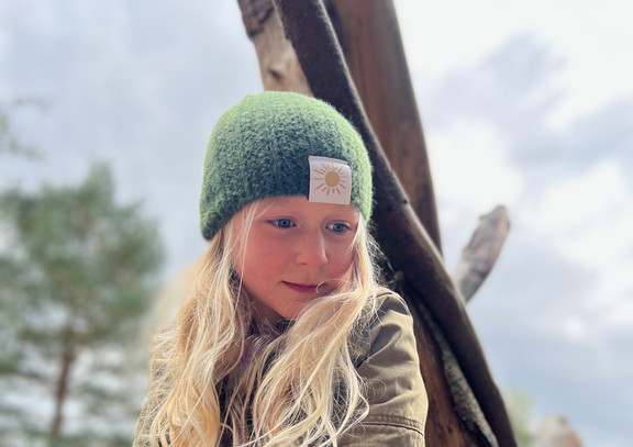 zachte groene kindermuts