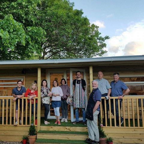 Eden Art Studio Students on porch.jpg