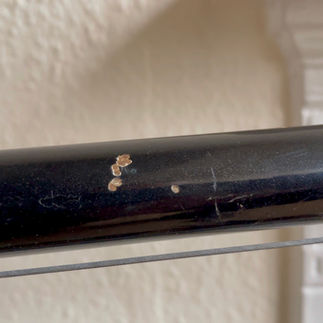 Rusty chips on the frame of a vintage Bianchi Gold Race Special bike.