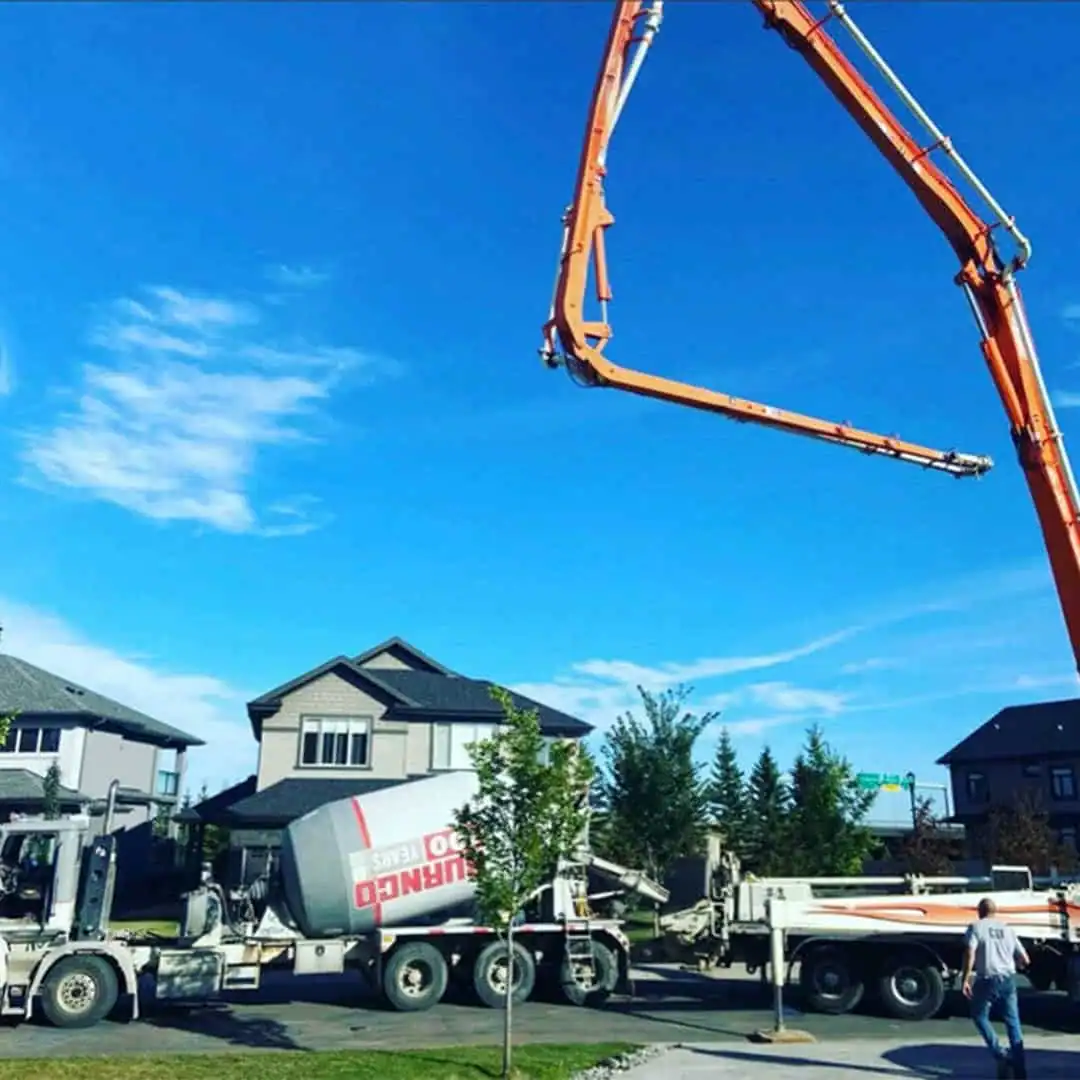 Concrete pump pouring a residential concrete slab in Edmonton