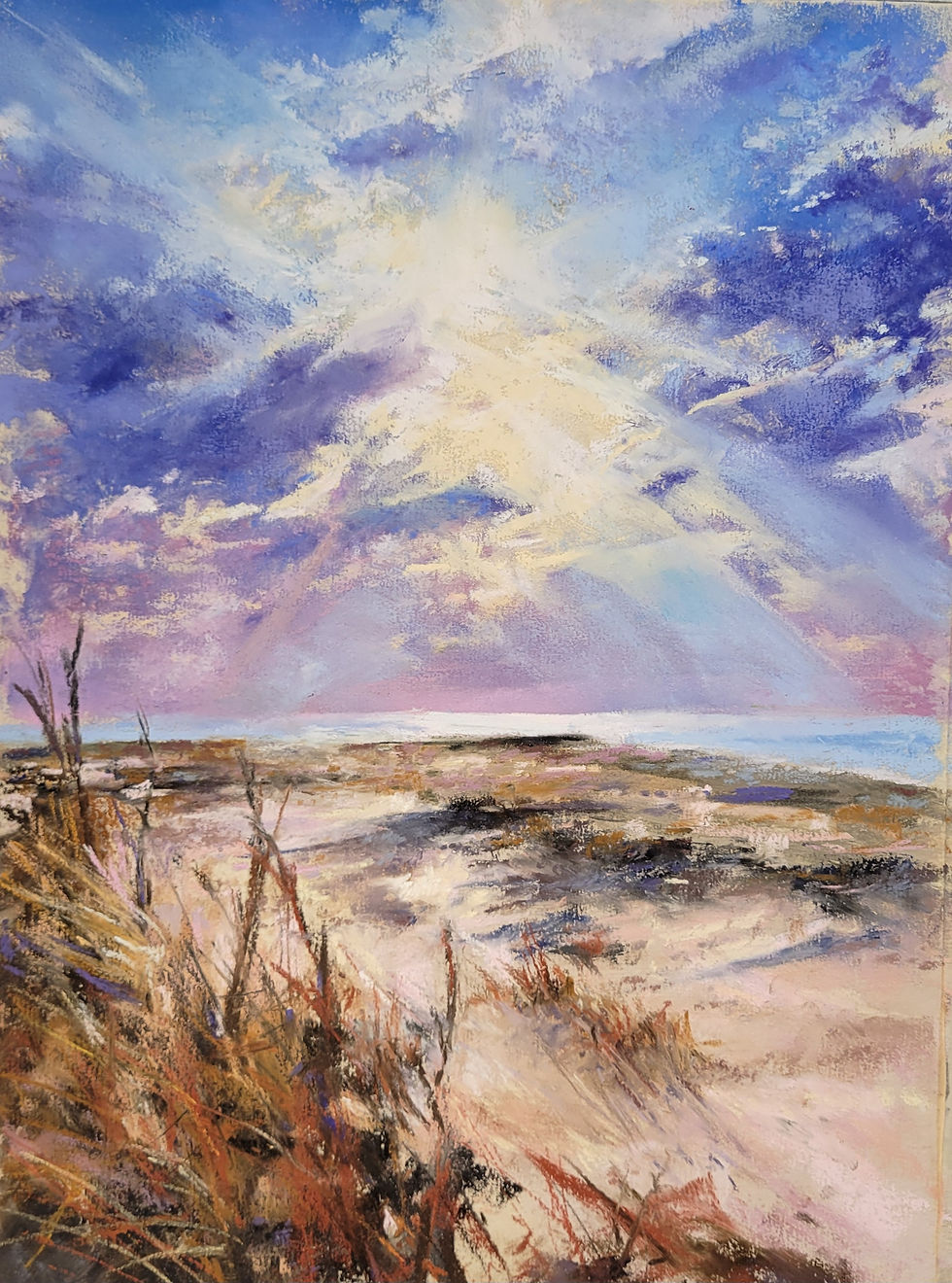 Sunlight beams over Lake Fork, sandy shore
