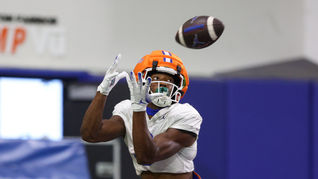 player catching football