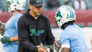 Football coach and player