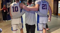 players walking with coach