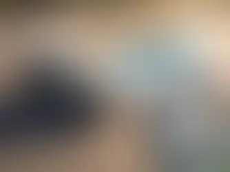 A split-screen image showing a dog in a parked car on a hot day and a smartphone displaying a UBITracer app car temperature monitor for hyperthermia alert.