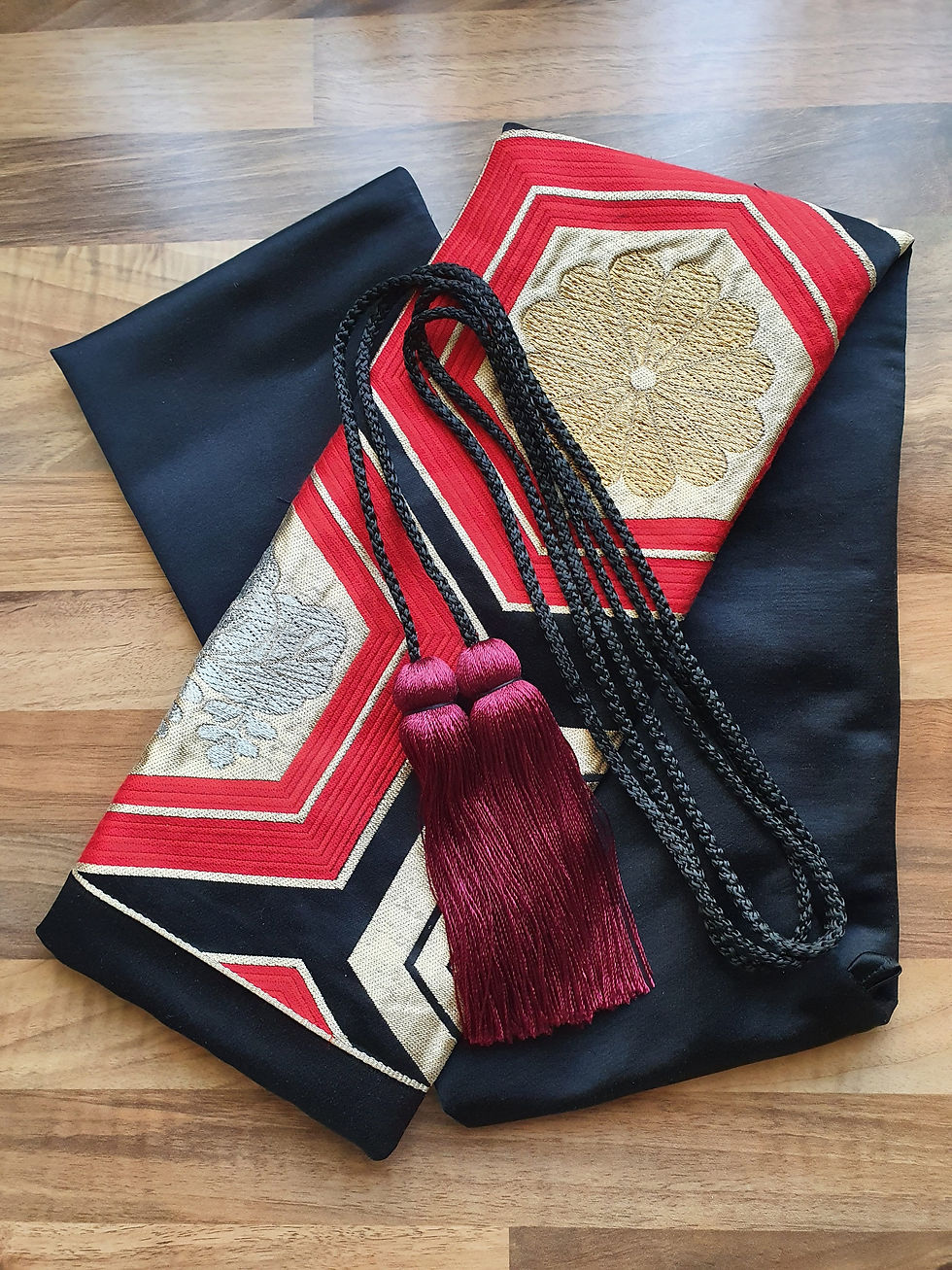 Thumbnail: Black, red, gold
