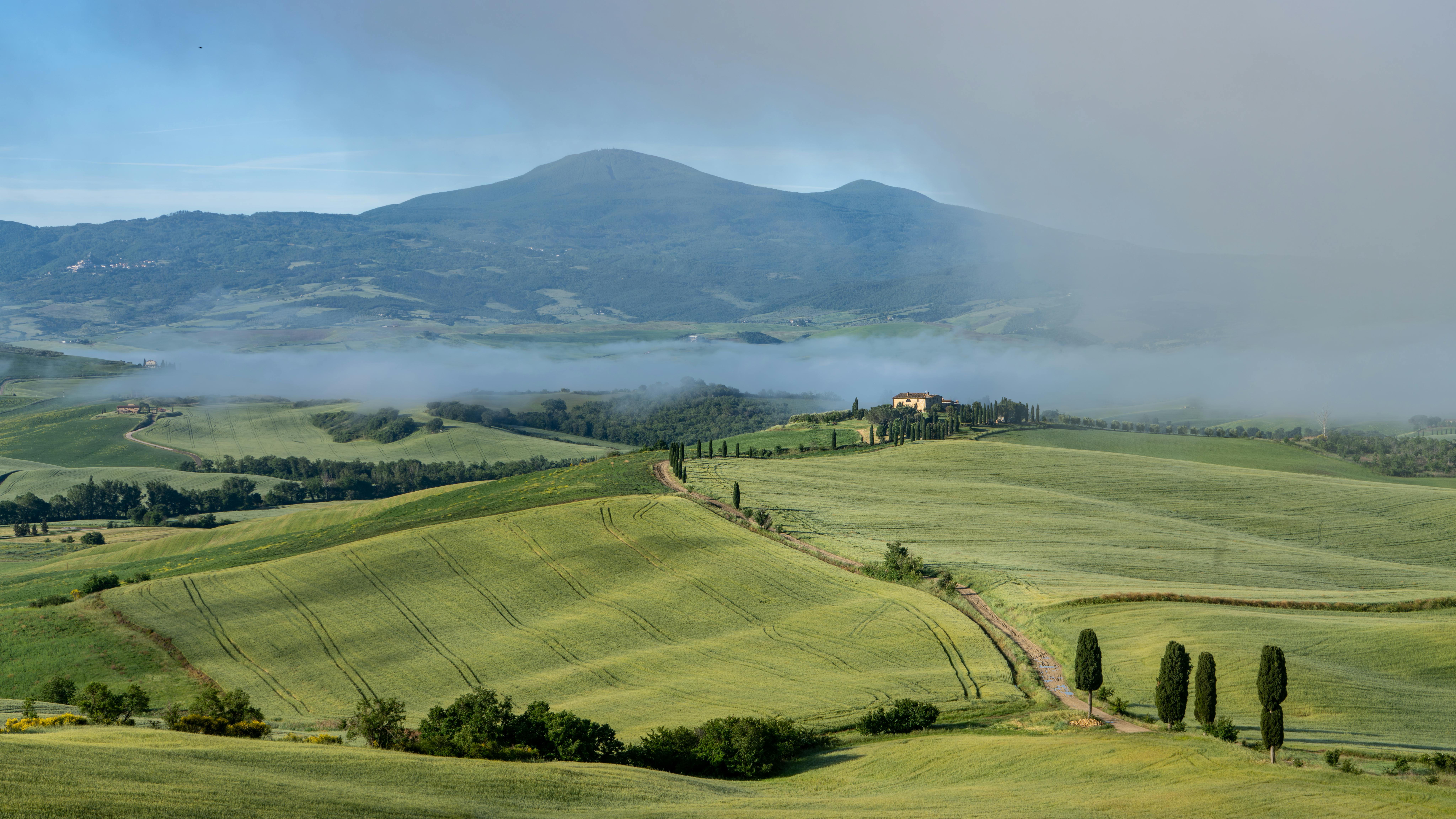 Rolling hills of San Quirico d'Orcia, Val d'Orcia, Tuscany — UNESCO World Heritage Site