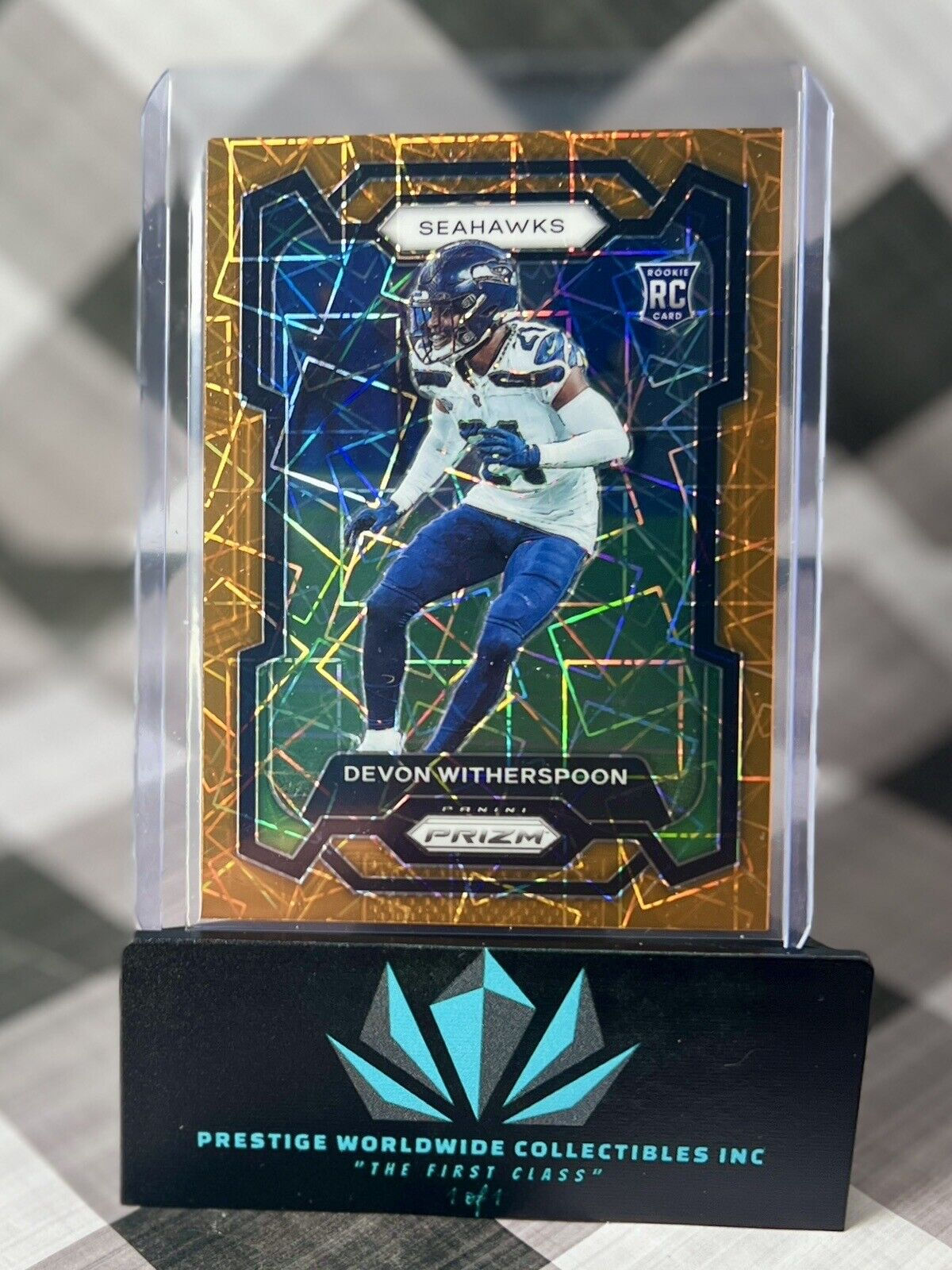 Devon Witherspoon 2023 Panini Prizm Rookie Orange Laser Prizm #389 Seahawks RC