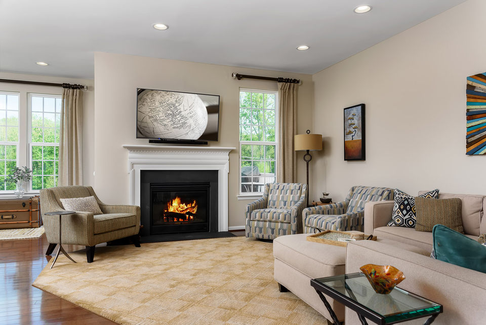 Living room with a fireplace and modern furniture