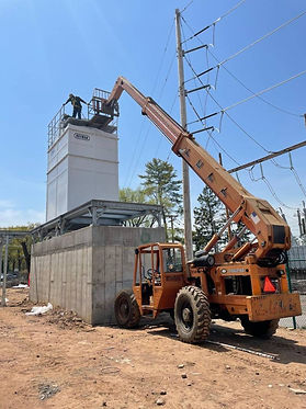Industrial fan installation on cooling tower using telehandler - ABC Crating & Rigging services