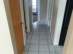 CERAMIC TILE FLOORS IN HALLWAY