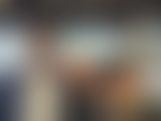 RH1 CEO Claude Rety with partners and suppliers at IAAPA Expo 2025, discussing innovation and industry trends