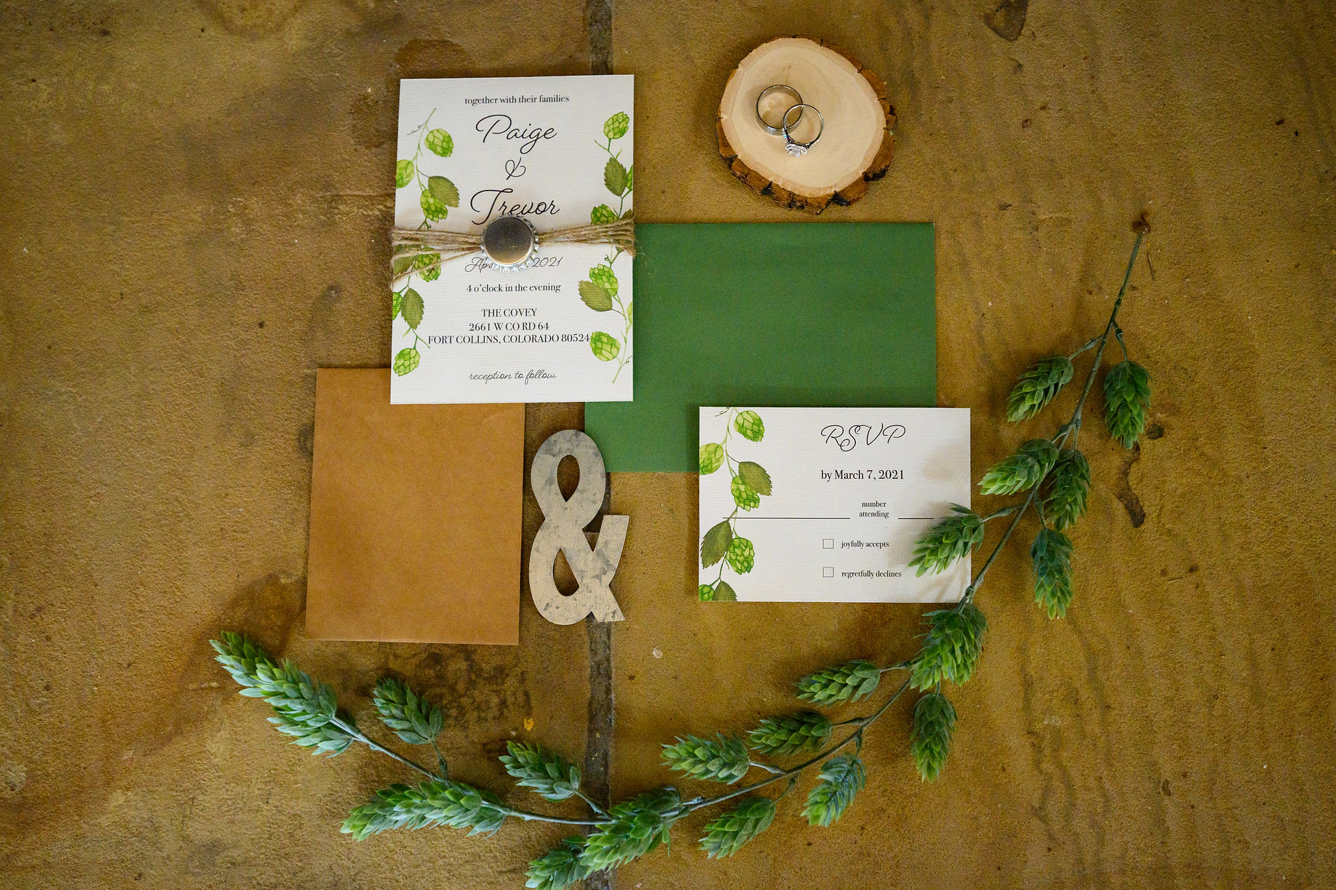 Hop plant with wedding invitation at Fort Collins, Colorado wedding for beer lovers