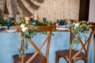 Wedding table details with blue accents and florals
