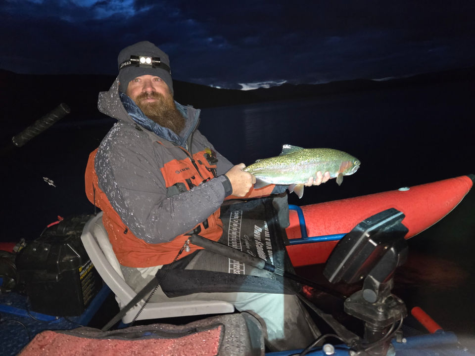 A gorgeous Rainbow trout caught while fishing on his Dave Scadden Rampage inflatable fishing boat. A successful night fishing!