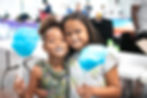 Children receiving support and care through The Greatest Commandment Inc.'s back-to-school community initiative in Orlando