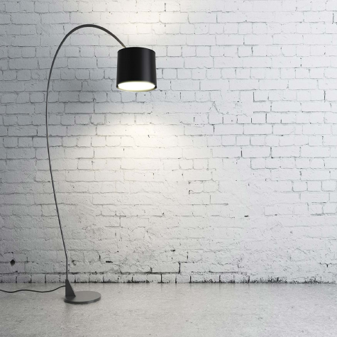 overhead lamp against brick wall