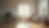 Eye-level view of a quiet living room with two empty chairs facing each other