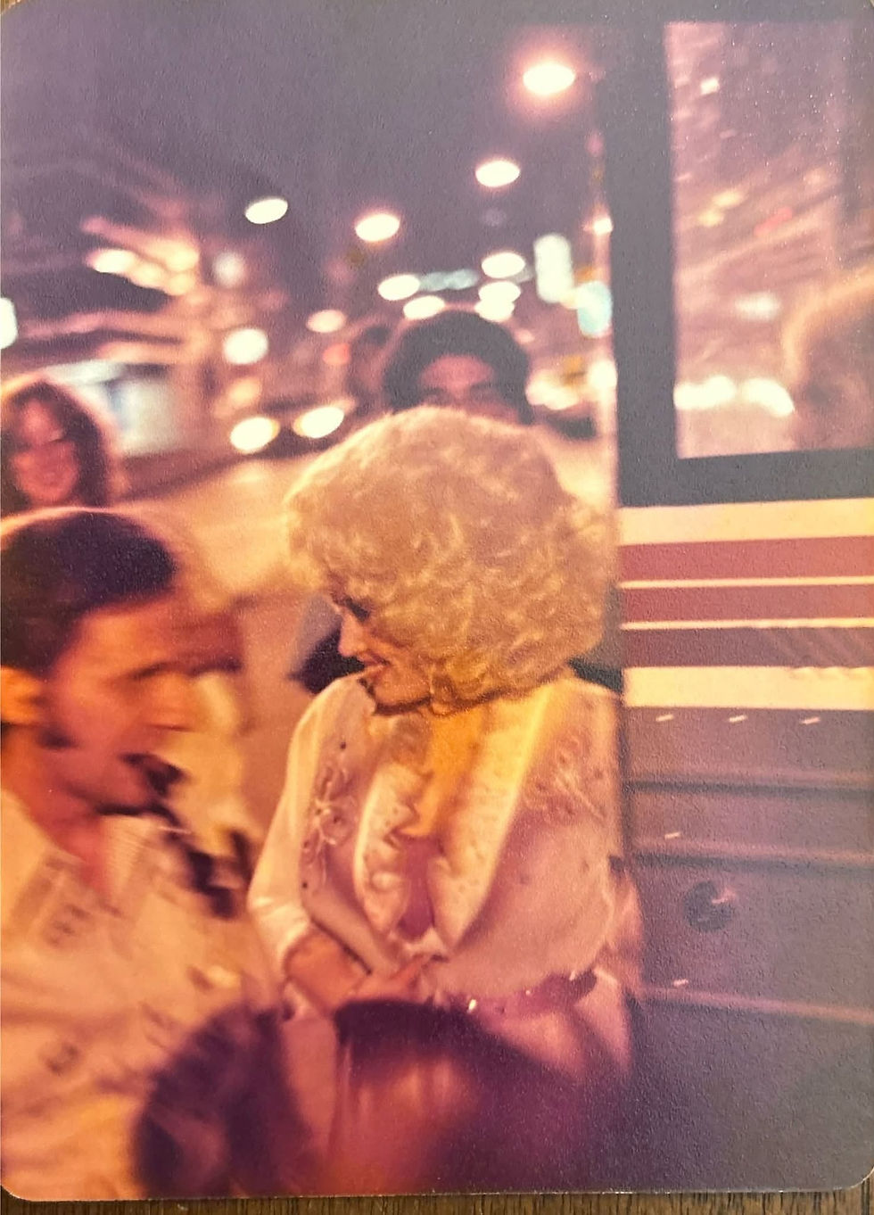 Dolly stepping off tour bus