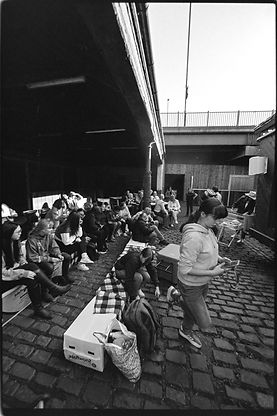 The picture shows a group of young inner city horse riders from Stepney Bank Stables in Newcastle standing beside the wayfaring cinema