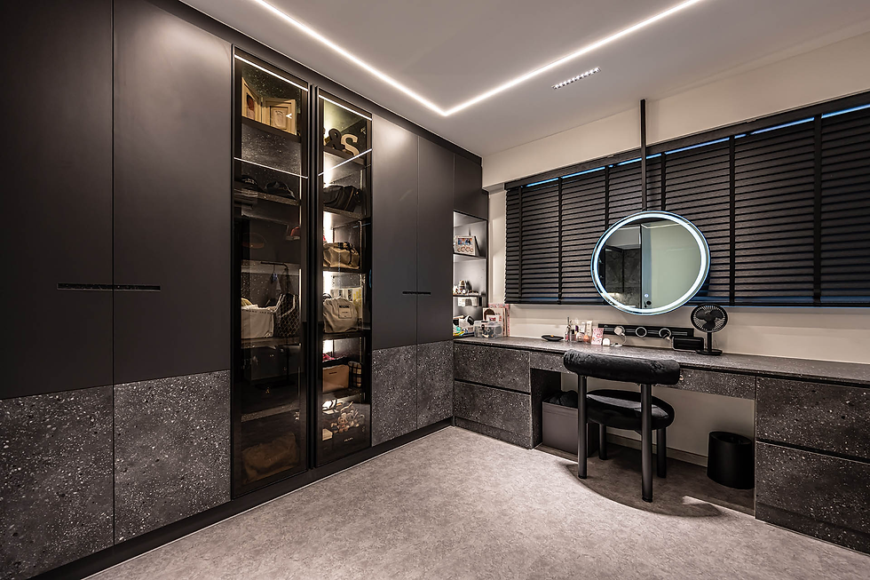 The new walk-in wardrobe has tons of storage space — including a display shelf for bags— as well as a large vanity area.