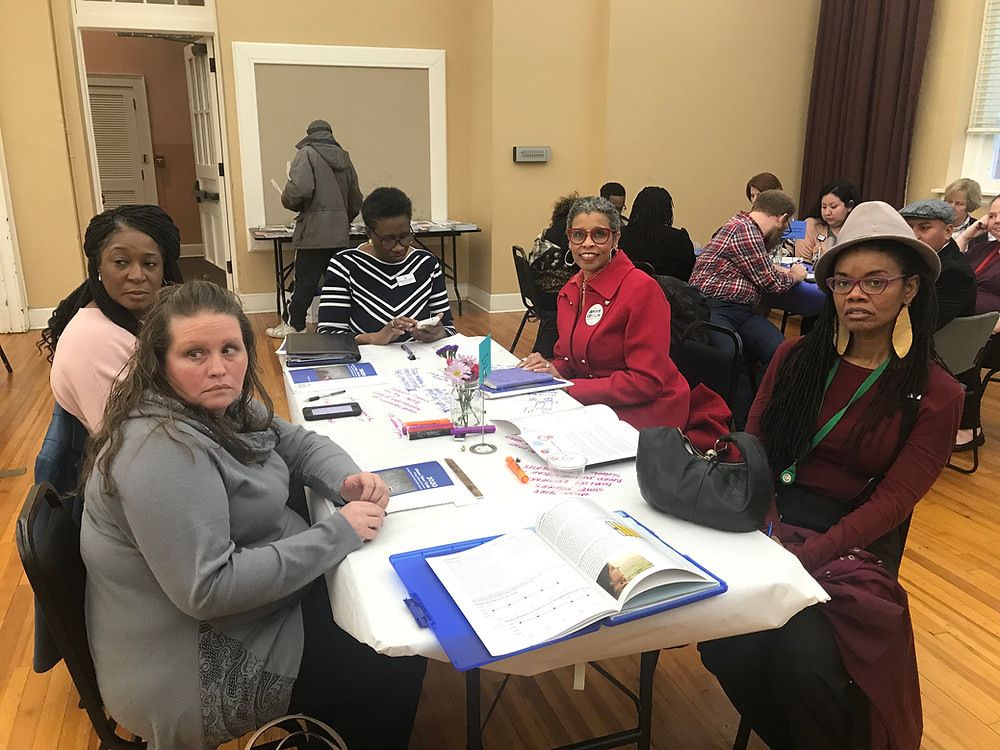 Candidate Jannie Cotton and attendees at the Arkansas Kids Count Coalition Policy Roundtable
