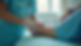 Close-up view of a nurse gently washing a patient's foot in a healthcare setting