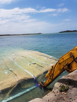 Deploying scour mattress