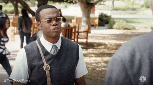 Henry wears red bedazzled cowboy boots and asks Chidi if he likes them