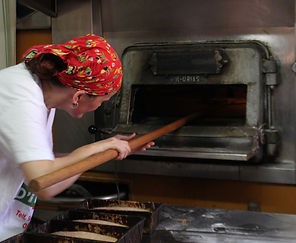 Loading the bread oven.JPG