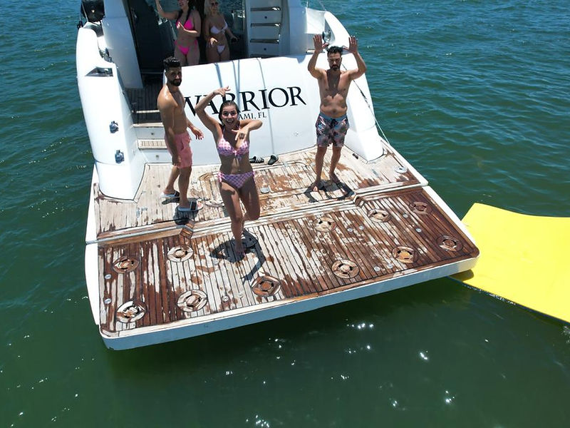 65ft Aicon yacht rental Miami - comfortable lounge area for group celebrations