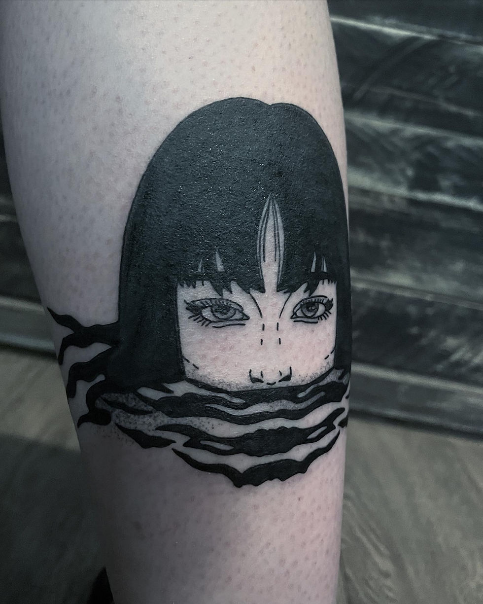 Blackwork tattoo with geometric shapes and bold lines by Mike in Malta.